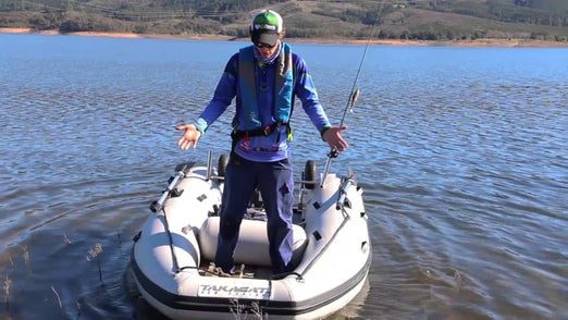 Man fishing with the Takacat T380S Inflatable Boat