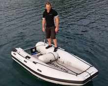 Load image into Gallery viewer, Man standing at the side of the Takacat T260S Inflatable Boat