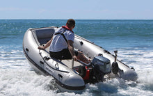 Load image into Gallery viewer, Man riding the Takacat T340S Inflatable Boat 