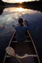 Load image into Gallery viewer, Woman paddling with the Merrimack Canoes Tennessean 14&#39;6&quot; Canoe at the lake