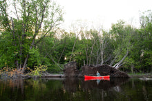Load image into Gallery viewer, Man canoeing with the Merrimack Canoes Baboosic - 14&#39; Solo Canoe Acadia red