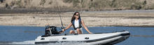 Load image into Gallery viewer, Woman riding the Takacat T300S Inflatable Boat