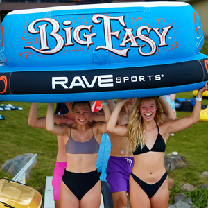 Rave Big Easy 4P Towable Tube with 4 people carrying it