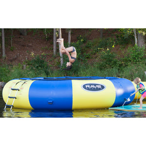 A kid back flit in Rave Sports Aqua Jump 120 Water Trampoline 00120