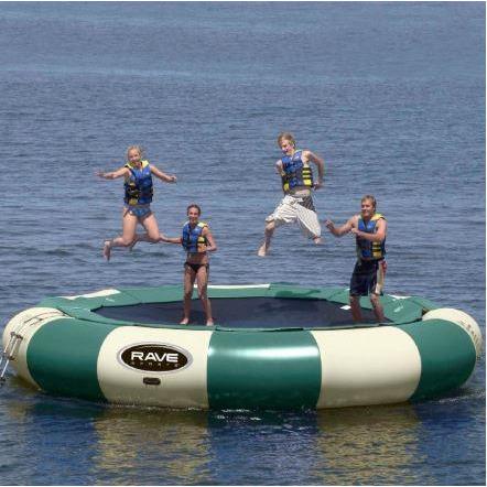 4 people enjoying the Rave Sports Aqua Jump 200 Northwoods Water Trampoline 00201