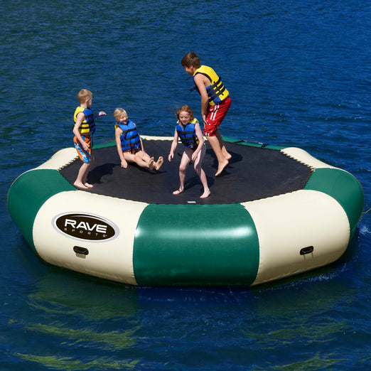 2 boys and 2 Girls in Rave Sports Northwood's Bongo Bouncer 20 - 20' Springless Water Bouncer 02021