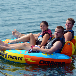 Rave Charger 3P Towable Tube being towed with 3 people riding on it