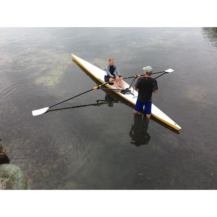 Boats - Man and Woman learning to row a Little River Marine Cambridge Rowing Shell