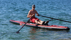 Man rowing with the ROWONAIR Dude 18' Inflatable Paddle Board