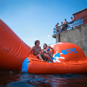 Guy And Girl On A Fat Boys Blob Water Launch Pads