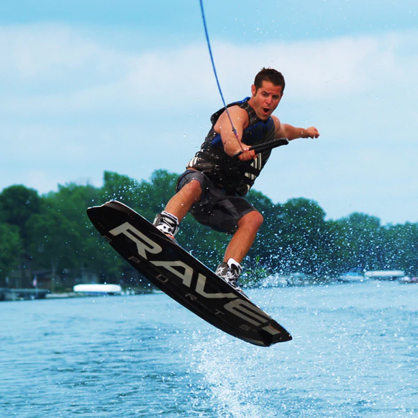 A man with Rave Freestyle Blue Wakeboard with RAVE boots
