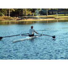 Load image into Gallery viewer, Boats -Man rowing on Little River Marine Olympus Rowing Shell on calm water.