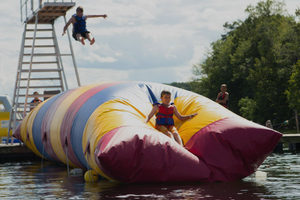 Children jumping in the WaterBlob® Classic Blob®