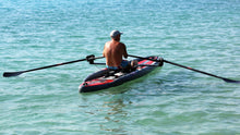 Load image into Gallery viewer, Man rowing the ROWONAIR iCoaster 18&#39; Inflatable Rowing Board