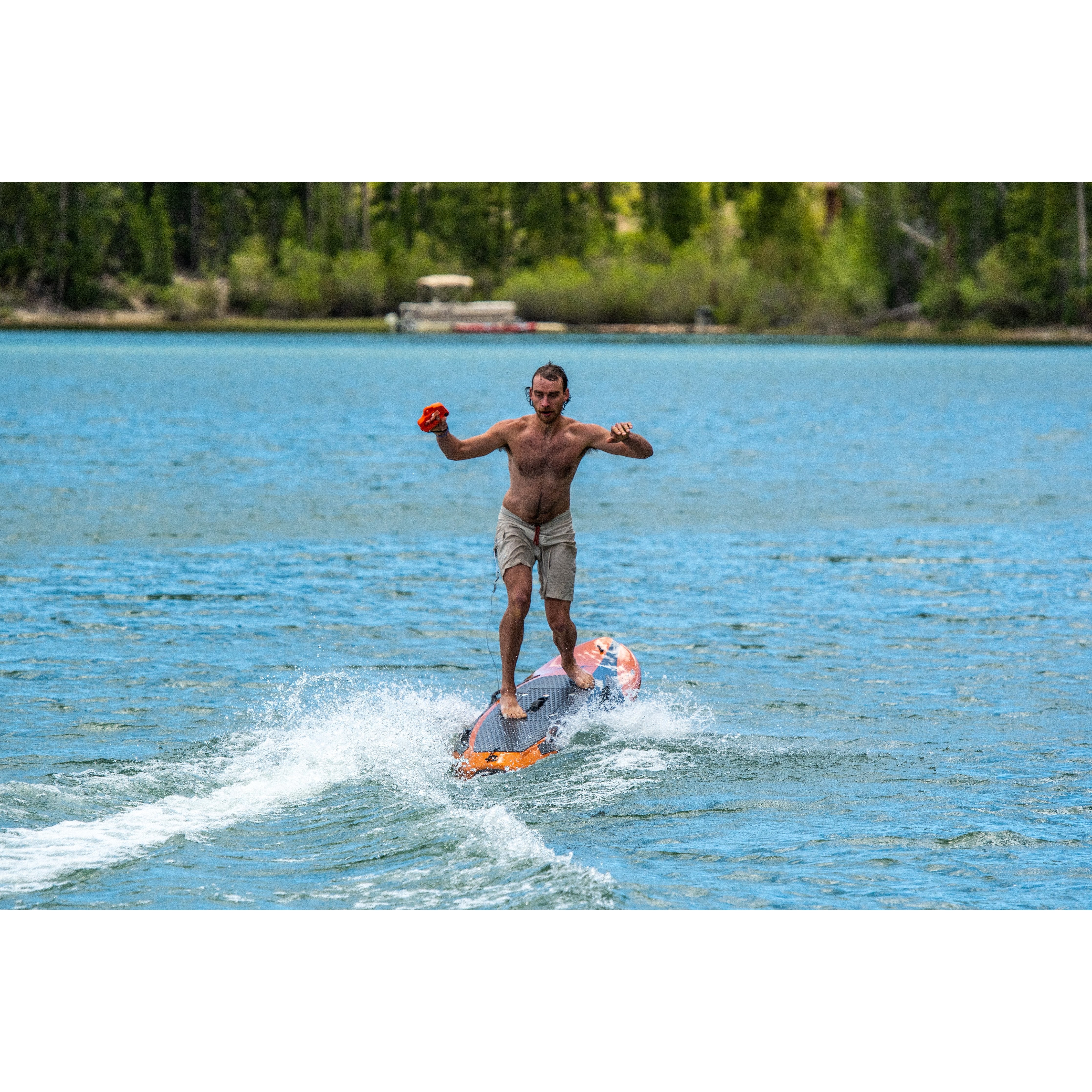 Man riding Yujet Electric Surfobard EJB-01