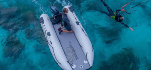 People doing watersports with the Takacat T260LX Inflatable Boat
