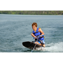 Load image into Gallery viewer, Rave Radial Kneeboard with a boy riding on it.