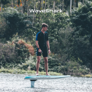 A man rides the WaveShark Electric Foil.