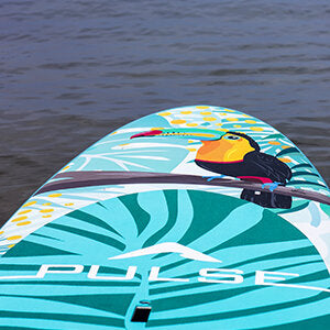 Pulse The Summy 11' Rectech Board floating on the beach