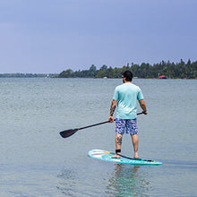 Load image into Gallery viewer, A man paddle boarding on a beach using Pulse The Summy 11&#39; Rectech Board