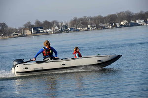 father and daughter cruising with the Takacat T460LX Inflatable Boat