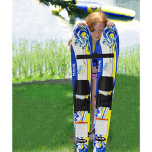 Load image into Gallery viewer, a kid holding the Rave Steady Eddy Trainer Water Ski