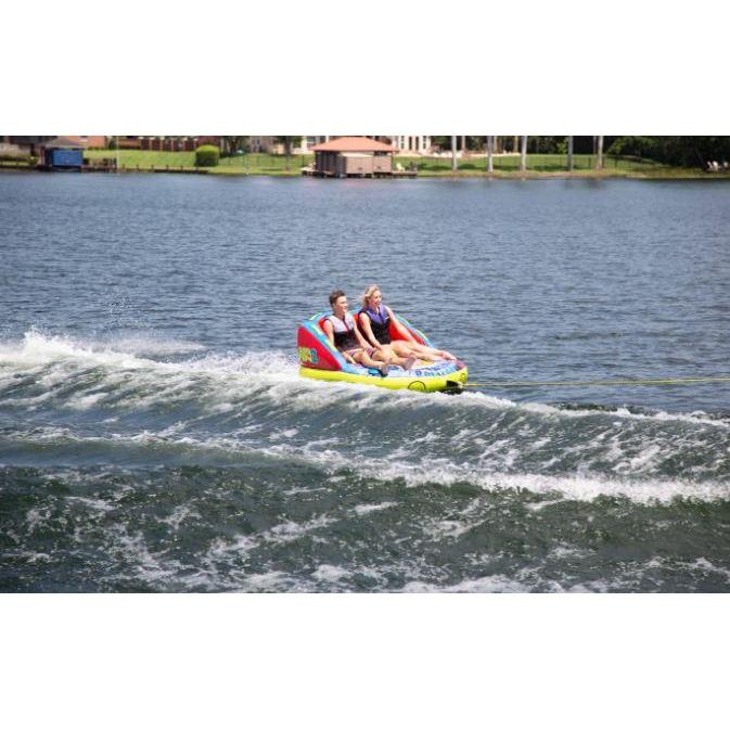 2 Persons Enjoying while Riding the Connelly Super Fun 2 2-Person Towable Tube