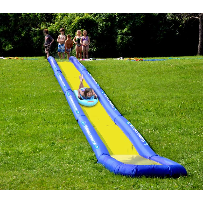 Kid is slidding with Rave 10' Turbo Chute Catch Pool in the end of the slide