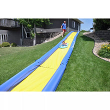Load image into Gallery viewer, Toddler riding the turbo water sled sliding in the Rave Sports 116&#39; Turbo Chute Package 02971-12 at the backyard