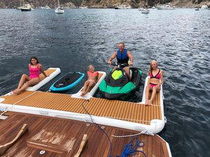 people enjoying at the YachtBeach Jet Ski Dock Double 4.10 with the Jet ski and the electronic board