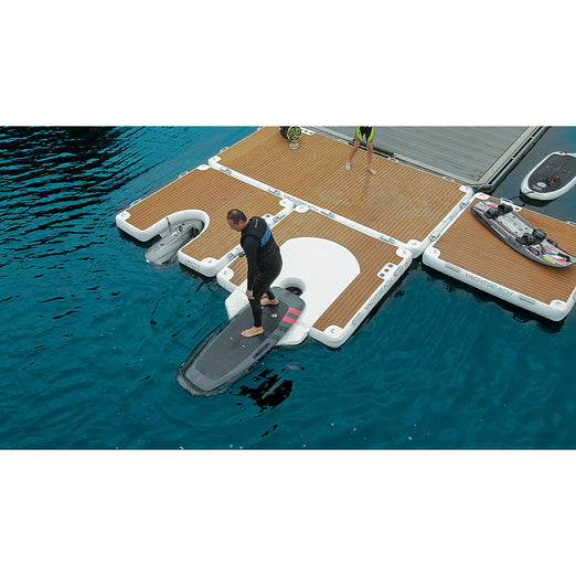 Man launching his foil from the YachtBeach Foil Dock Single 2.05 