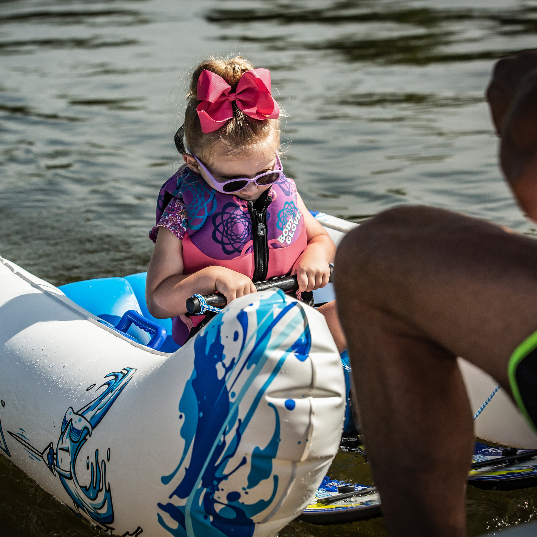 Water Ski Starter Package with the girl riding on it.