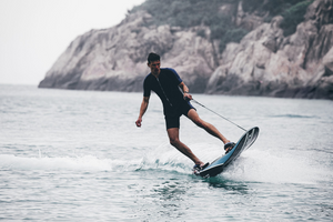 A man rides the WaveShark Electric JetBoard.