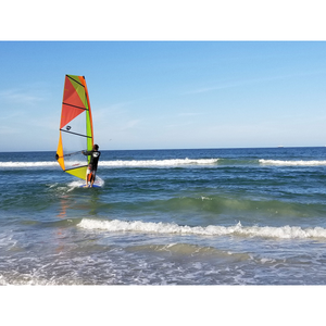 Windsurf Board - Man windsurfing with the Aerotech Sails 2021 Windsurfer LT Windsurf Board on not so rough water